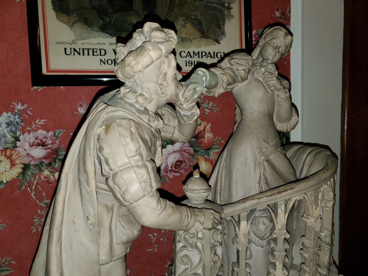 Faust and Marguerite Leaving the Garden sculpture, on display inside Bond County Museum
